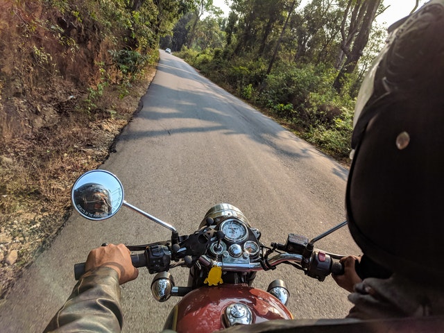 motorcyclist about to eat it